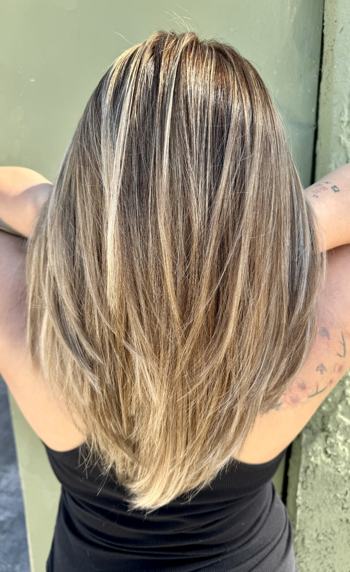 Dimensional blonde highlights on layered cut